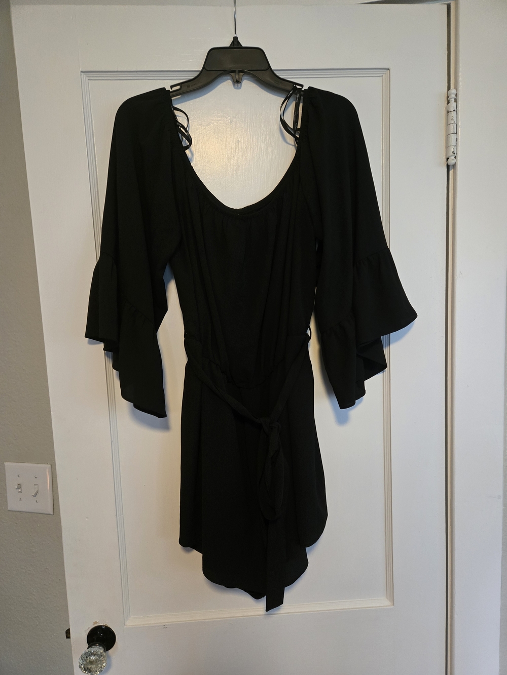 City Chic Black Jumpsuit with Flowy Bell Sleeves and Tie Waist